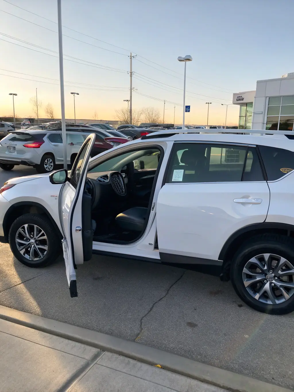 A detailed image of the 2020 Toyota RAV4 Limited's exterior, highlighting its modern design, LED headlights, and alloy wheels, set against a neutral background to emphasize its features.